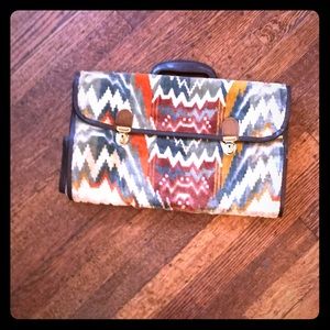 Vintage side saddle carpet bag.